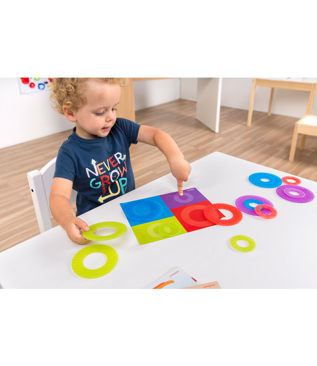 Miniland Miniland - MATH COLOR RINGS diam.9cm, doorzichtig, geschikt voor lightpad, 16 ringen en 4 speelkaarten, 2+