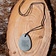 Pendentif en pierre de lave avec des éléments celtiques - Celtic Webmerchant
