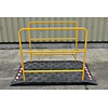 Yellow handrail for temporary pedestrian bridge