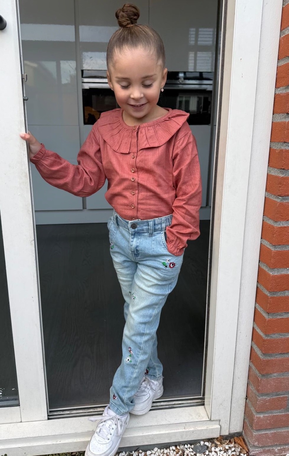 Spijkerbroek met bloemen