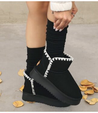 Something else furry boots