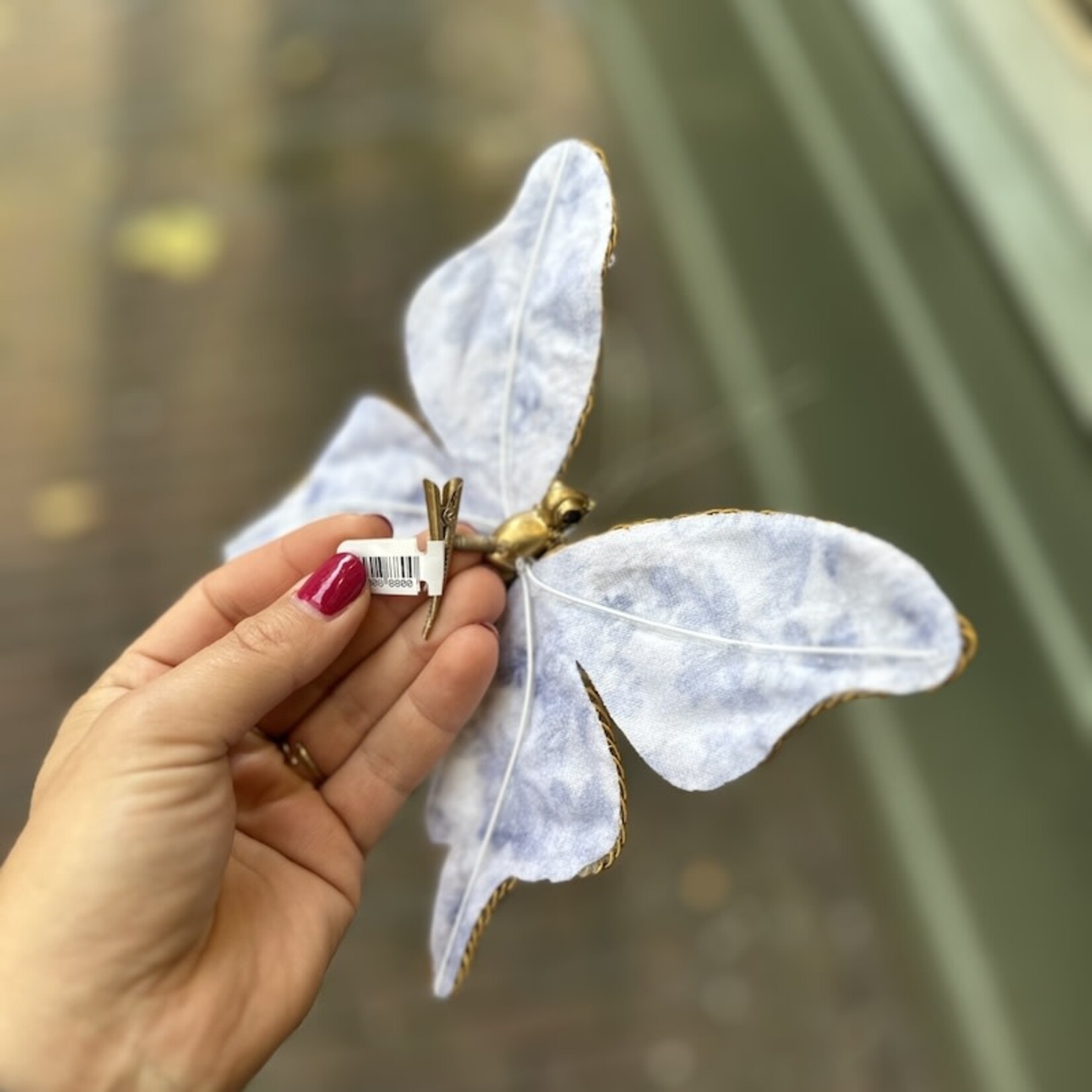 Vlinders op klip, goud