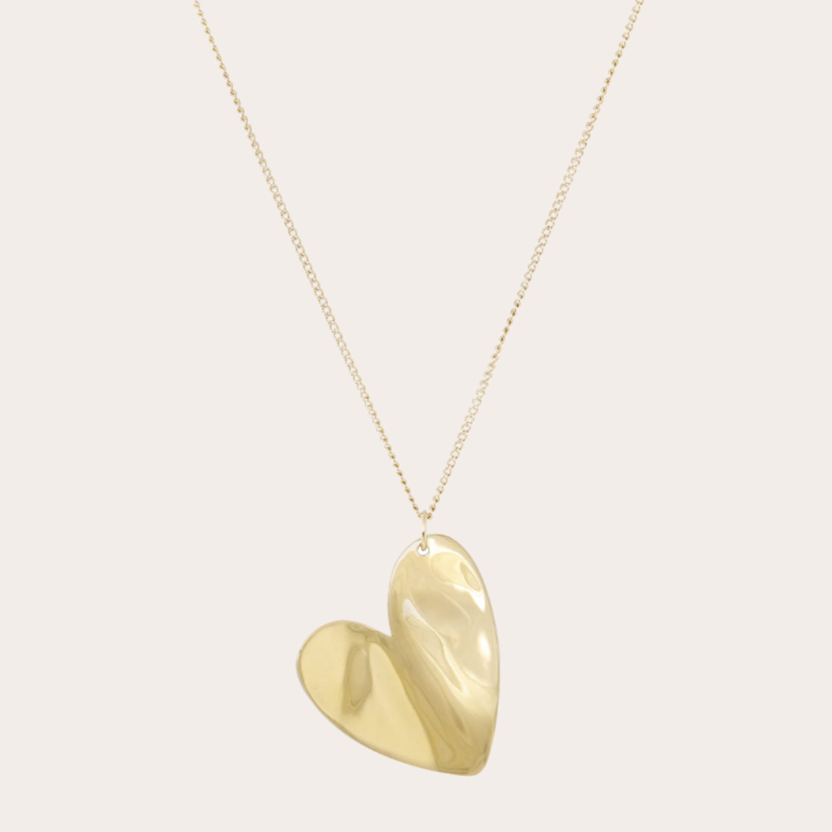 Korte ketting met groot gouden hart