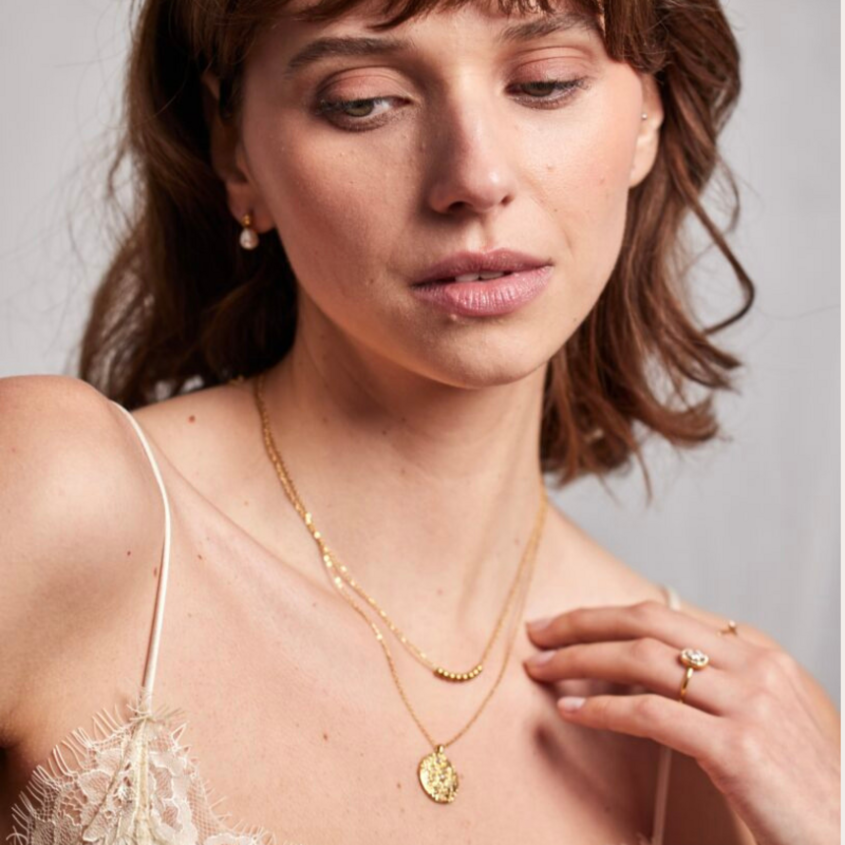 Ketting met gouden munt - steentjes