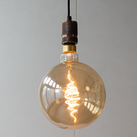 Filament-LED-lampa dimbar 8,5 watt, amber croissantspiral 200 mm