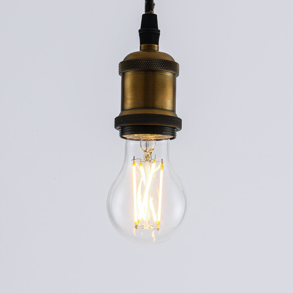 Filament-LED-lampa dim-to-warm 7 och 9 watt, klart glas