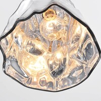 Designad pendellampa Napoli i vågigt kromglas