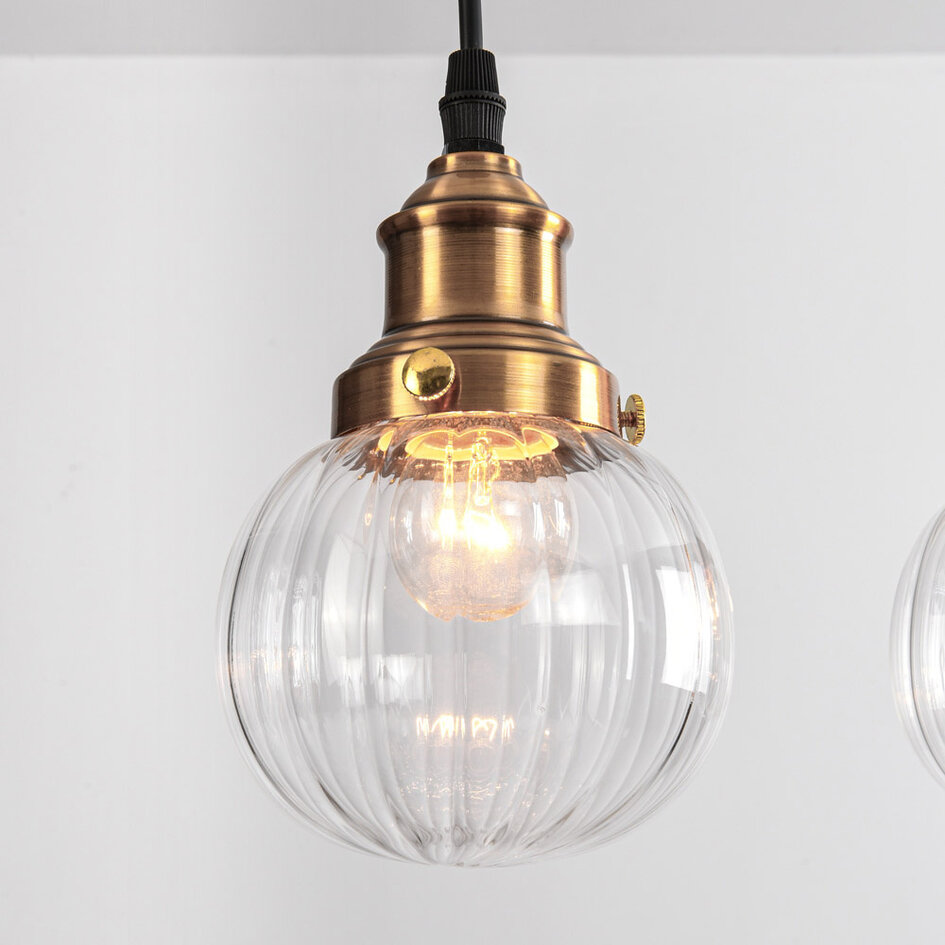Art deco-pendellampa Bologna med fyra lampor - transparent glas