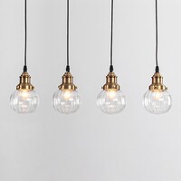 Art deco-pendellampa Bologna med fyra lampor - transparent glas