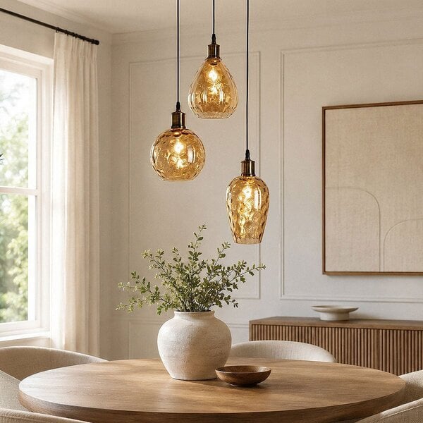 Designad pendellampa Verona med tre lampor - amberfärgat glas med rundad form