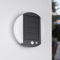 Modern solcellsdriven utomhusvägglampa med sensor i svart - Blitz