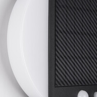 Modern solcellsdriven utomhusvägglampa med sensor i svart - Blitz