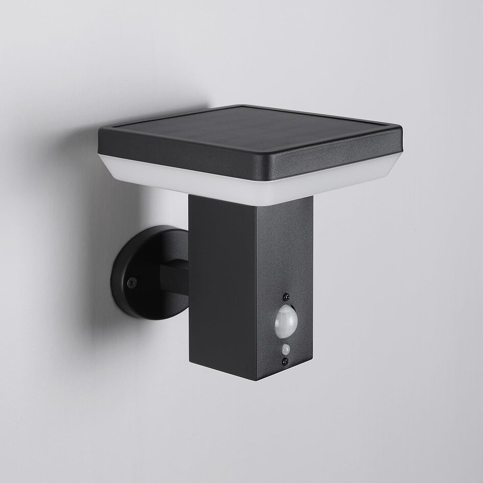 Modern solcellsvägglampa för utomhusbruk i svart med sensor - Aila