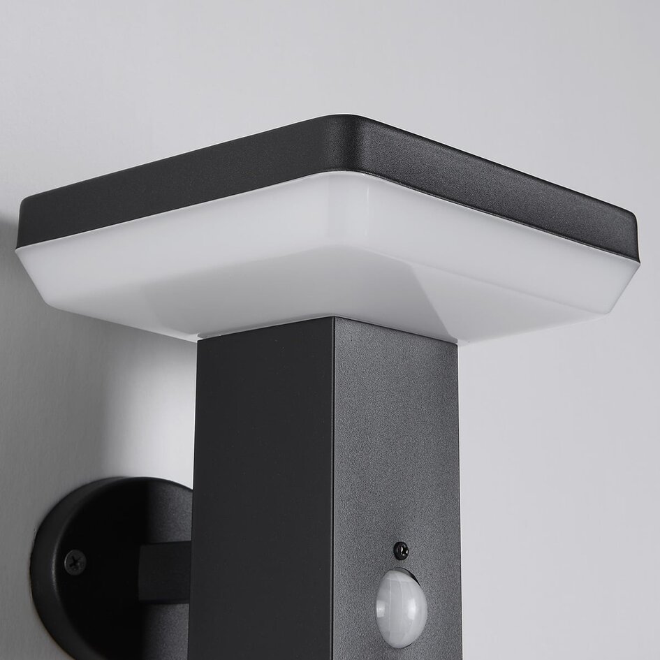 Modern solcellsvägglampa för utomhusbruk i svart med sensor - Aila