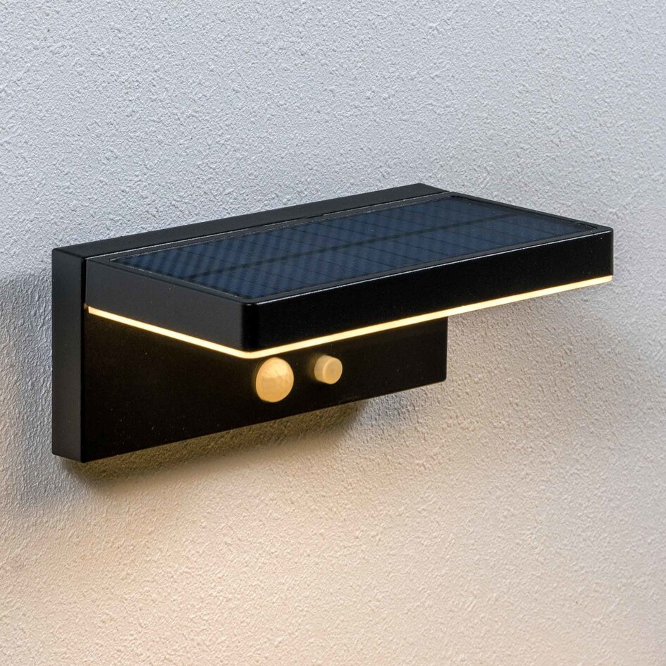 Modern solcellsvägglampa för utomhusbruk i svart med sensor - Hendrick