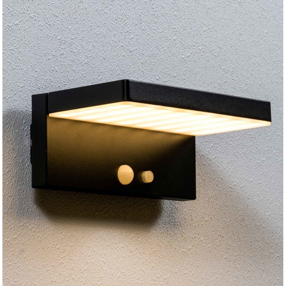 Modern solcellsvägglampa för utomhusbruk i svart med sensor - Hendrick