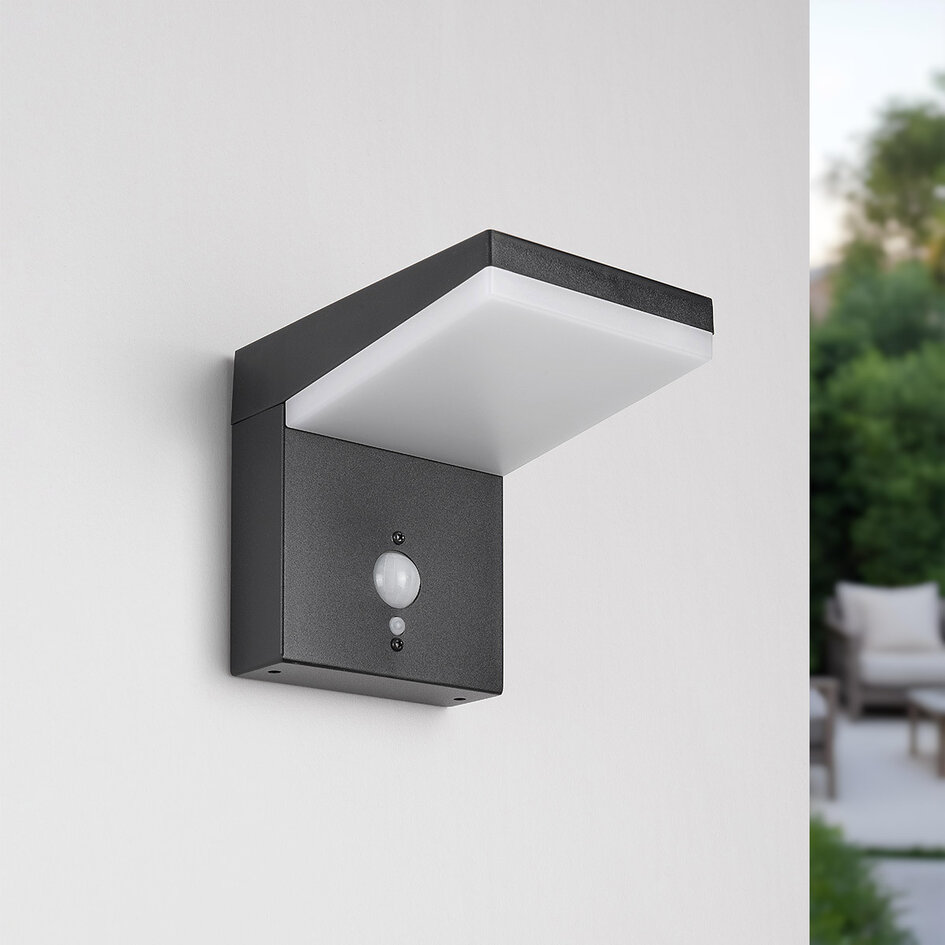 Modern solcellsvägglampa i svart med sensor - Halo