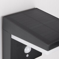 Modern solcellsvägglampa i svart med sensor - Halo