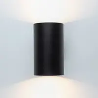 Modern vägglampa Meg i svart med guldfärgad insida