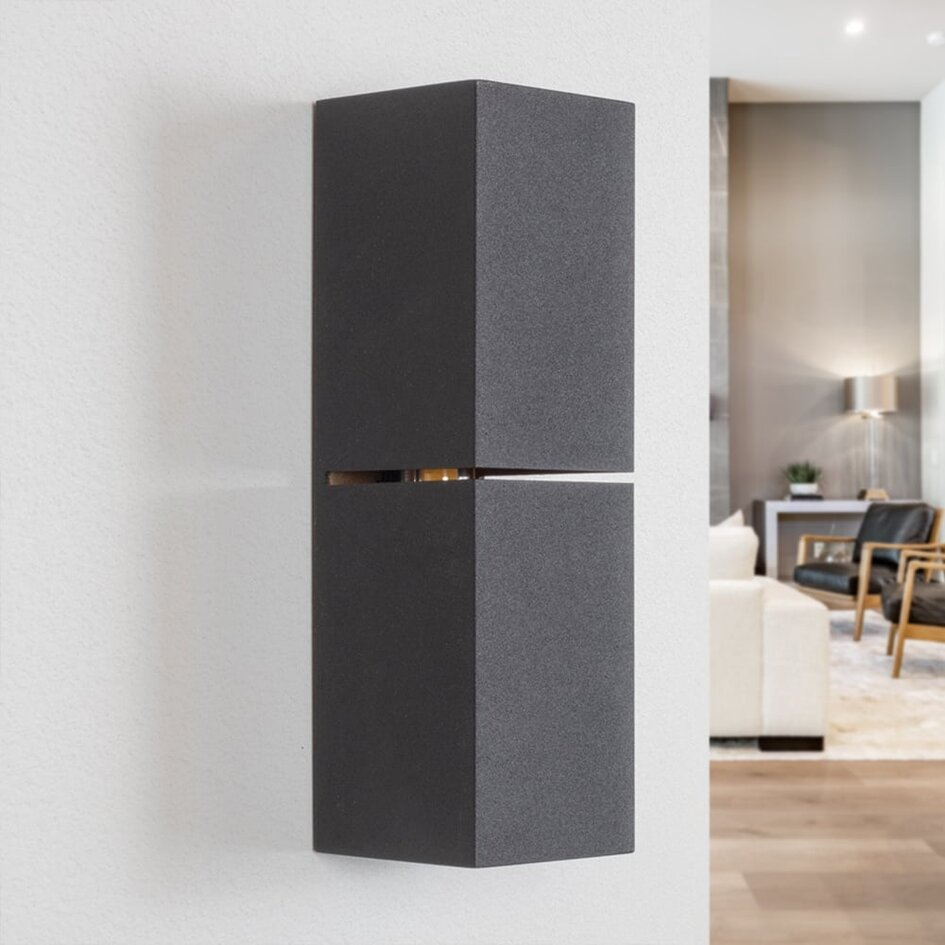 Modern vägglampa Zev i svart med guld