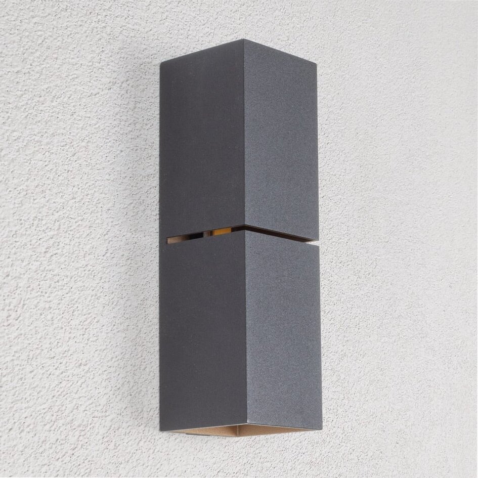 Modern vägglampa Zev i svart med guld