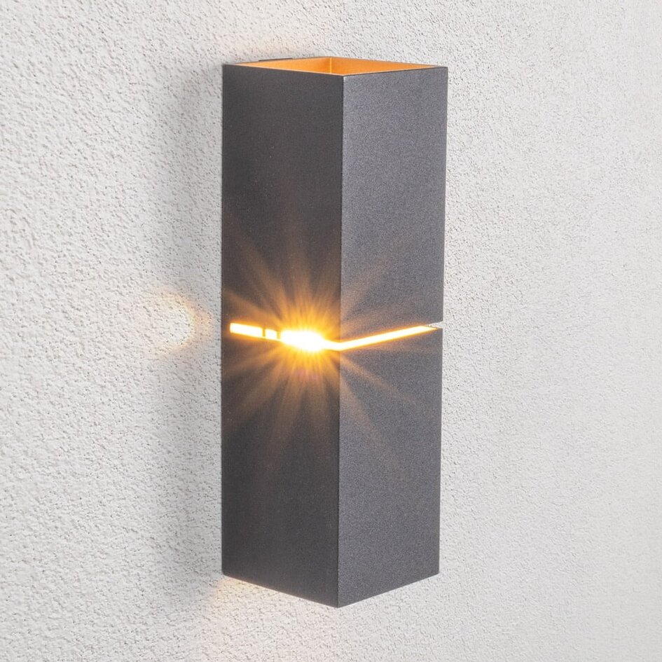 Modern vägglampa Zev i svart med guld