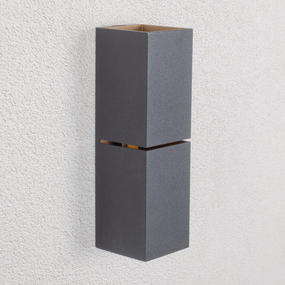 Modern vägglampa Zev i svart med guld