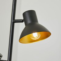 Industriell golvlampa Bailey med tre lampor i svart med guld