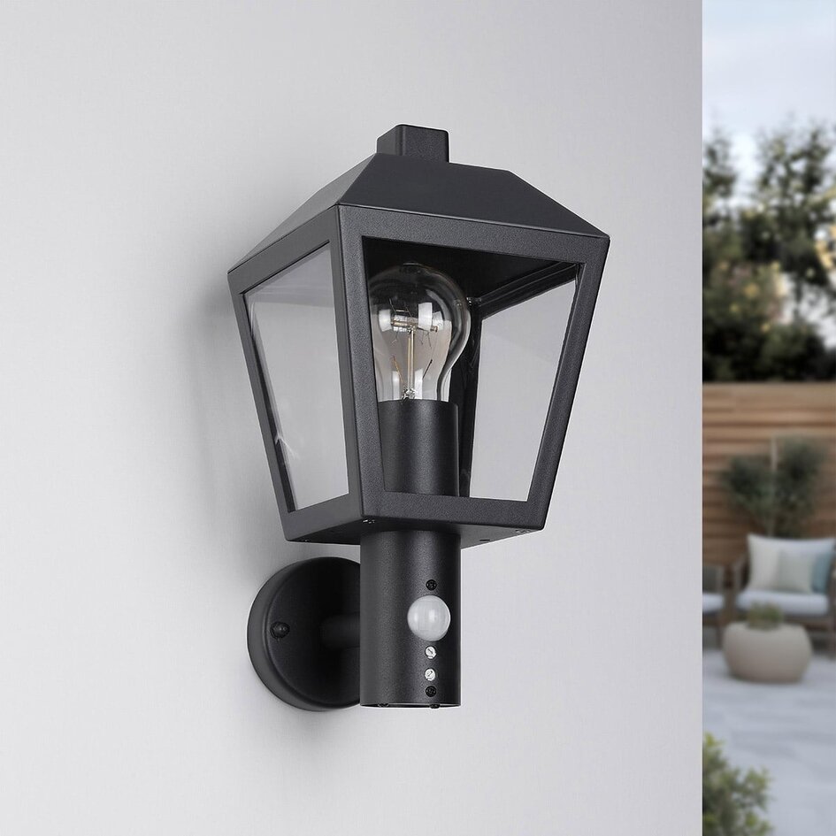 Lantlig utomhusvägglampa Dax med sensor - svart