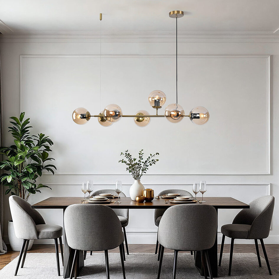 Designad pendellampa Sette med sju lampor - amberfärgat glas och guld