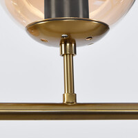 Designad pendellampa Sette med sju lampor - amberfärgat glas och guld
