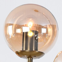 Designad pendellampa Sette med sju lampor - amberfärgat glas och guld