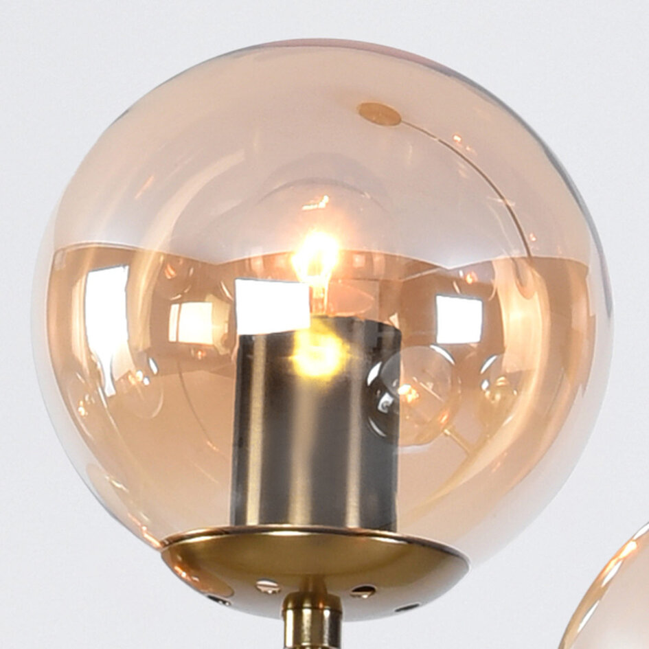 Designad pendellampa Sette med sju lampor - amberfärgat glas och guld