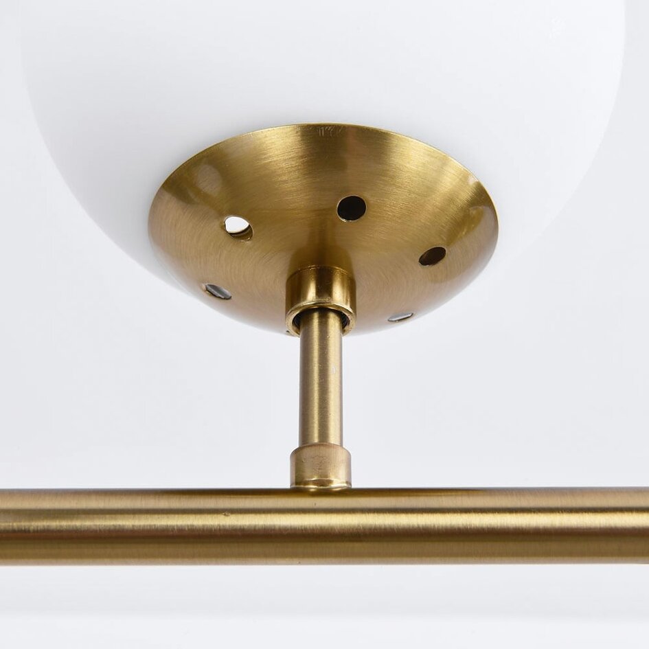 Design taklampa Hepta med mjölkglasglober