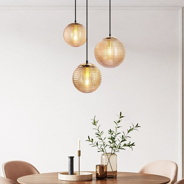 Designad pendellampa Sila med tre lampor - räfflat amberfärgat glas
