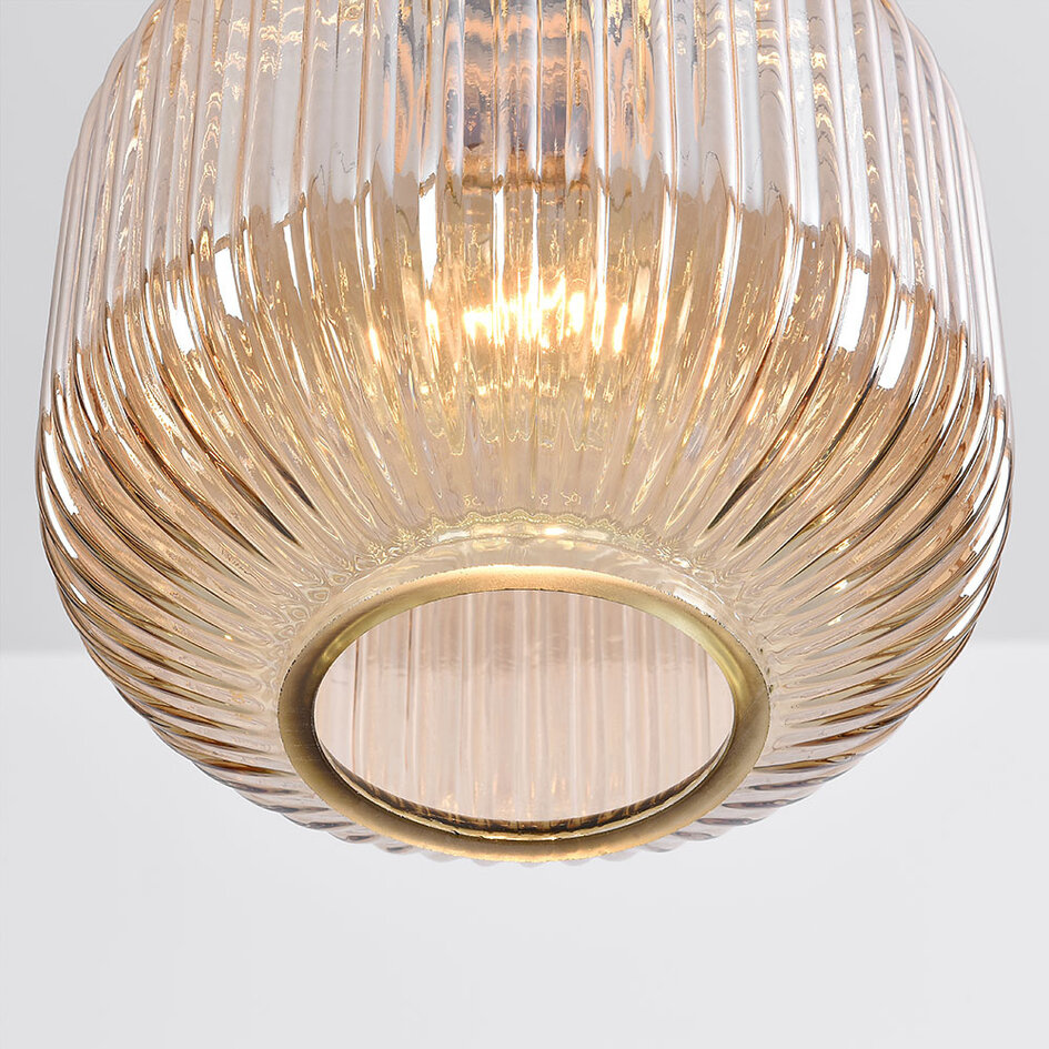 Designad pendellampa Sita med tre lampor - svart och guld med amberfärgat glas
