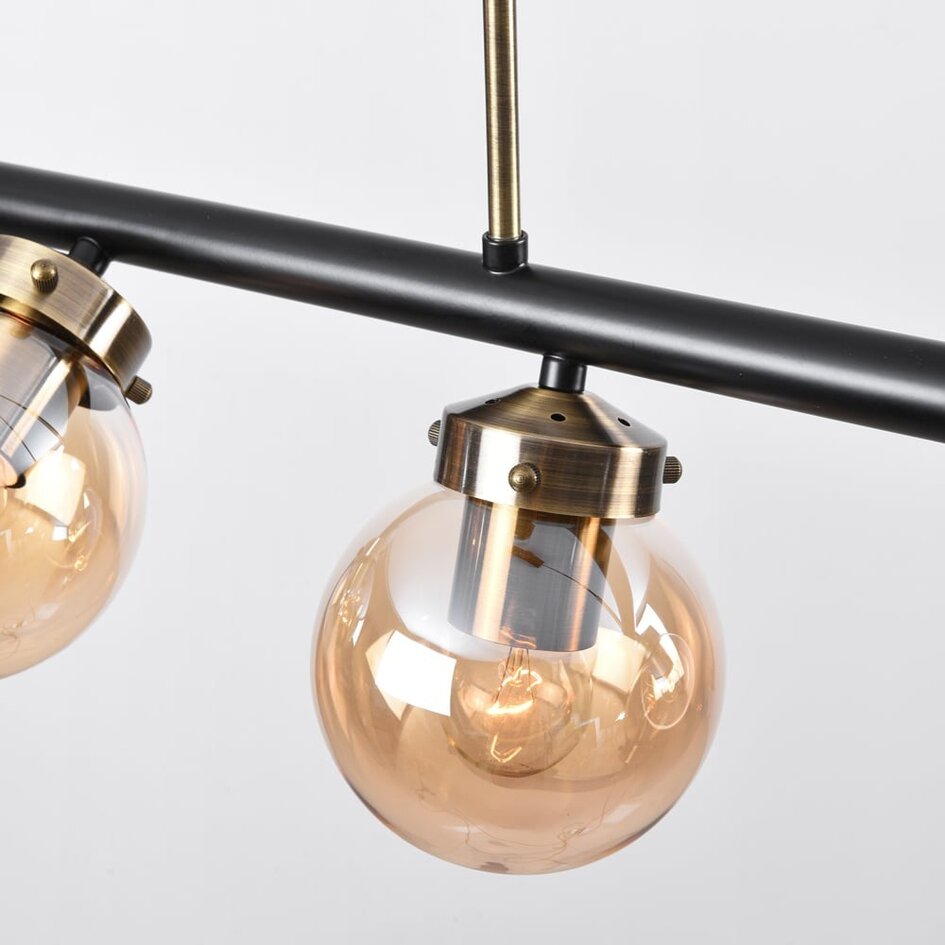Designad pendellampa Guadeloupe med sex lampor - amberfärgat glas