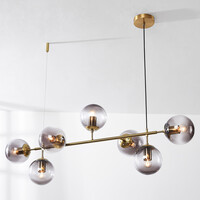 Designad pendellampa Hepta med 7 glaskulor i rökfärgat glas