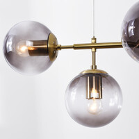 Designad pendellampa Hepta med 7 glaskulor i rökfärgat glas