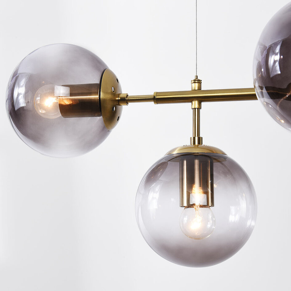 Designad pendellampa Hepta med 7 glaskulor i rökfärgat glas