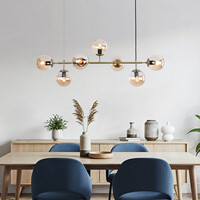 Designad pendellampa Hepta med 7 amberfärgade glaskulor
