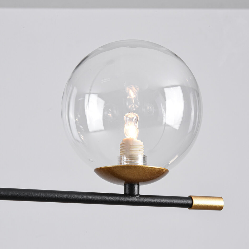Pendellampa Nisha med sex lampor i transparent glas - svart och guld
