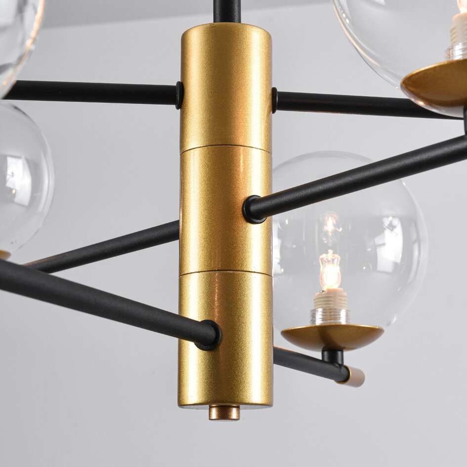 Pendellampa Nisha med sex lampor i transparent glas - svart och guld