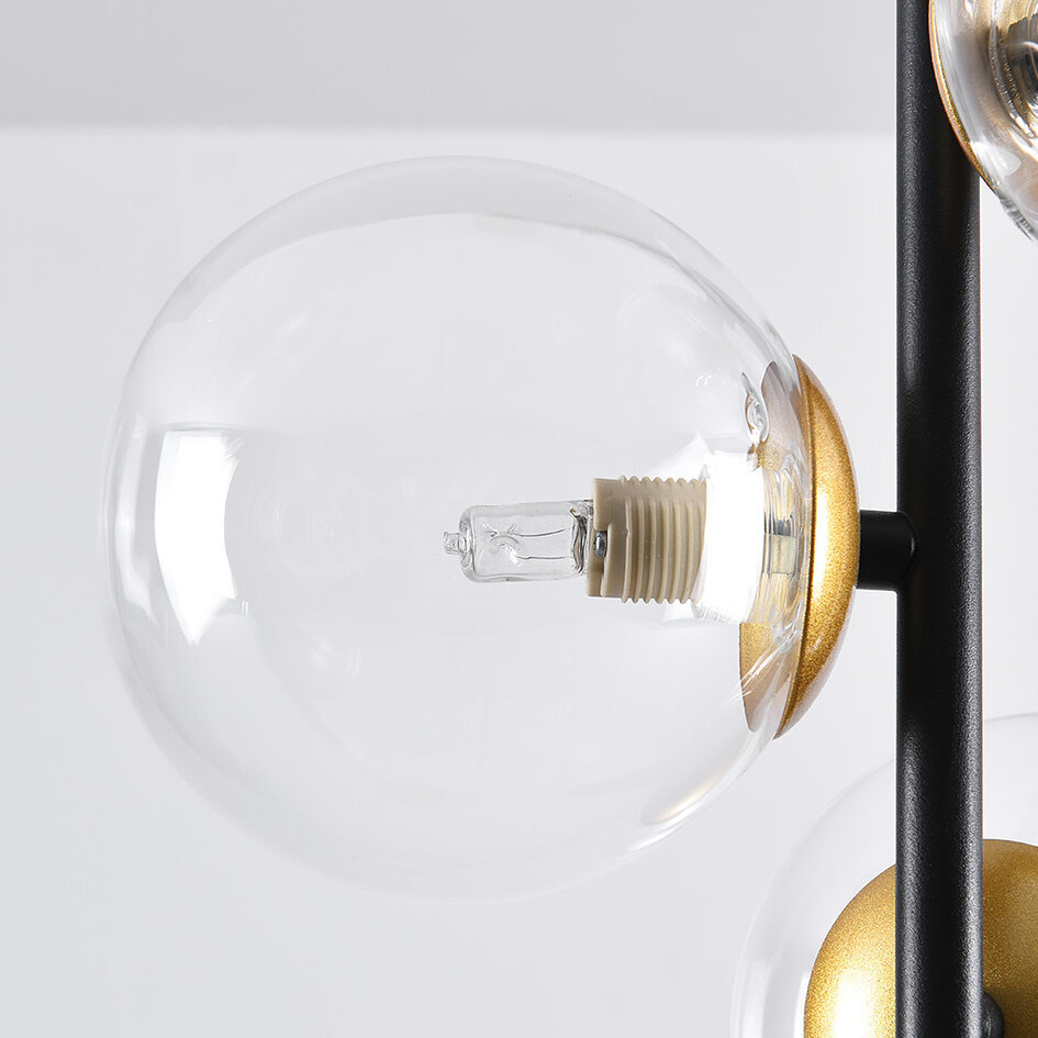 Pendellampa Nisrin med tre lampor i transparent glas - svart och guld