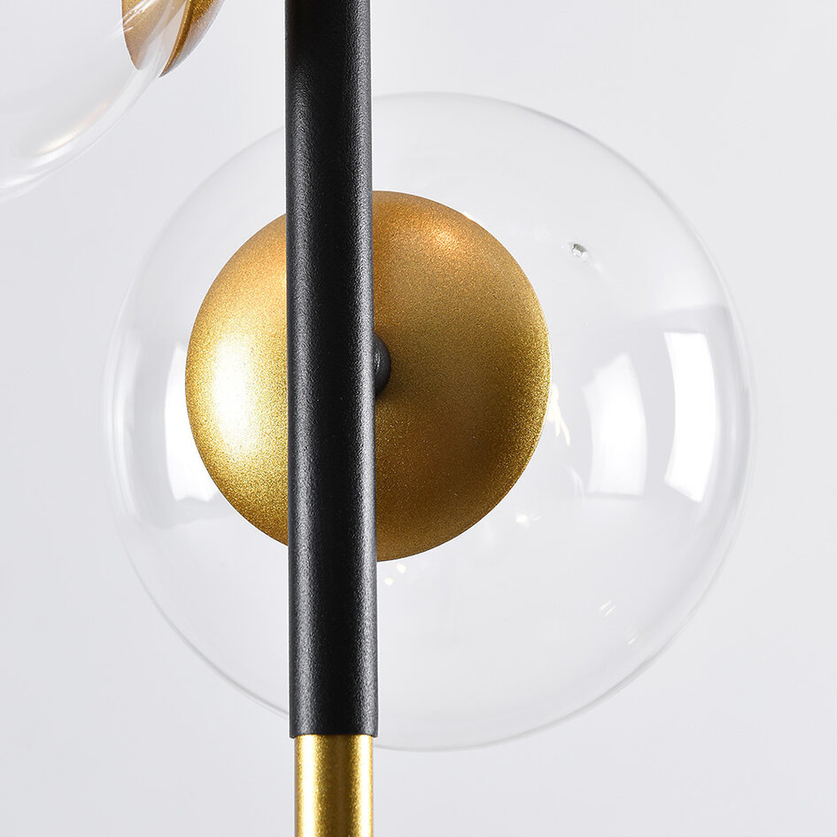 Pendellampa Nisrin med tre lampor i transparent glas - svart och guld