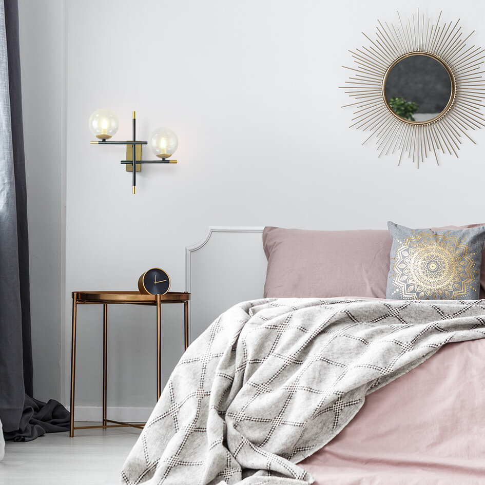 Vägglampa Niya med två lampor i transparent glas - svart och guld