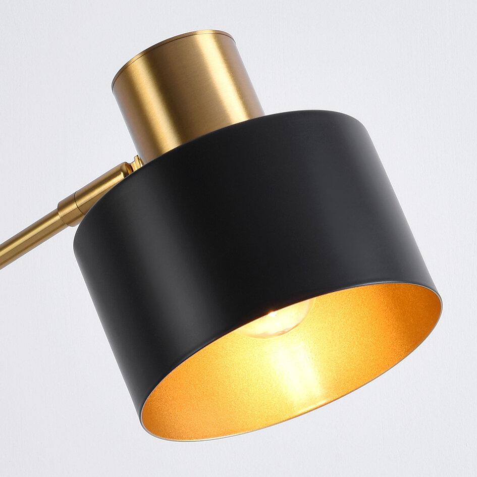 Bordslampa Rhys - svart med gulddetaljer och vinklingsbar arm