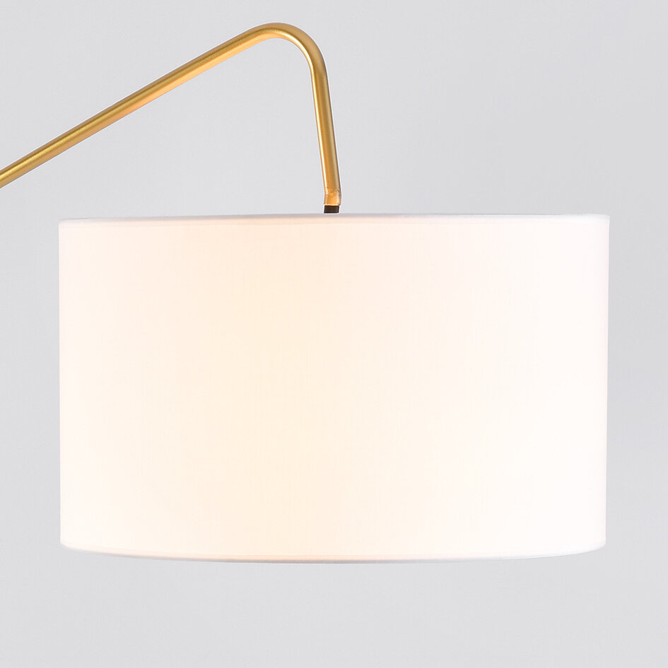 Designad golvlampa Monica i marmor med guldfärgade detaljer