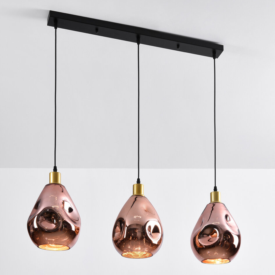 Designad pendellampa Rick med tre lampor och vågigt glas - roséguld