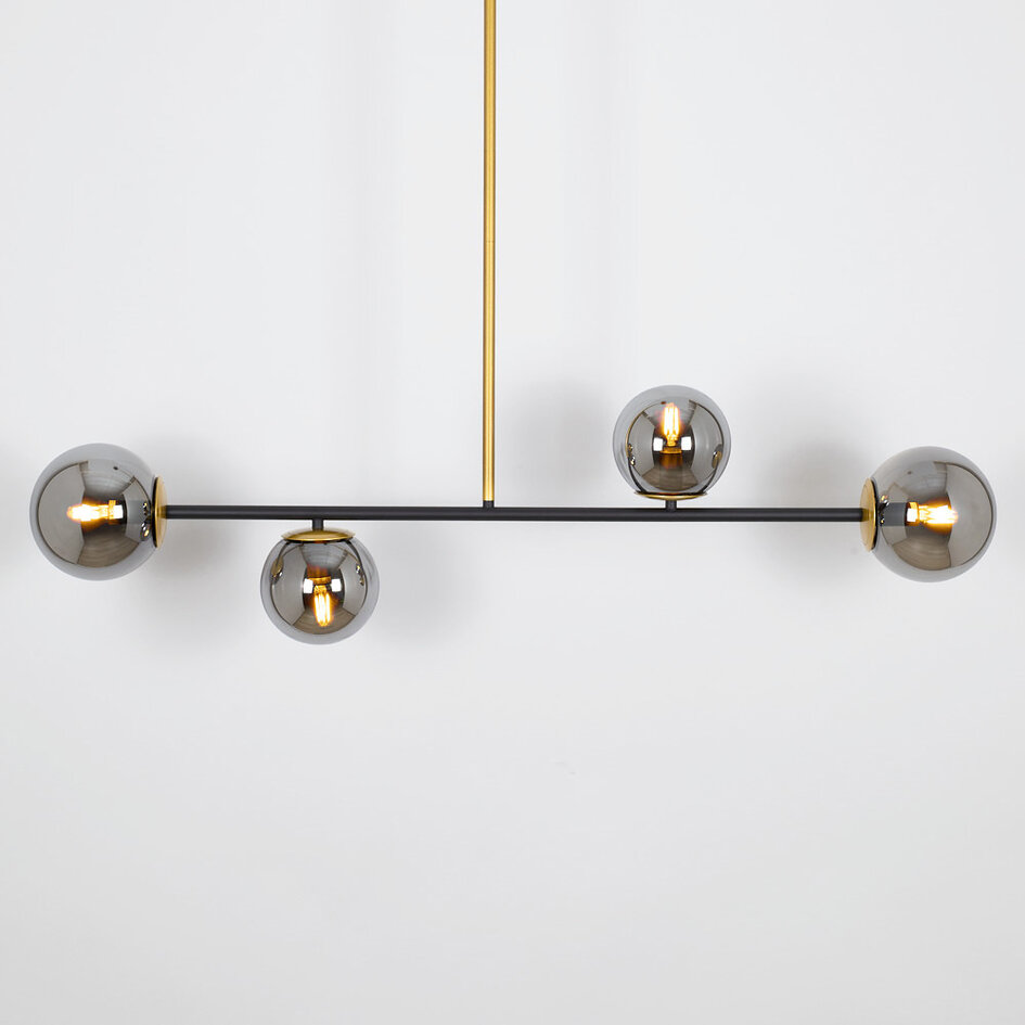 Designad pendellampa Davy med fyra lampor och glaskulor
